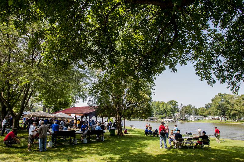 Hundreds of veterans, boy scouts, and volunteers gather Wednesday August 21, 2013, at Lions Park in Fox River Grove for Cary-Grove AmVets Pearl Harbor Memorial Post 245's 26th annual picnic for hospitalized veterans.