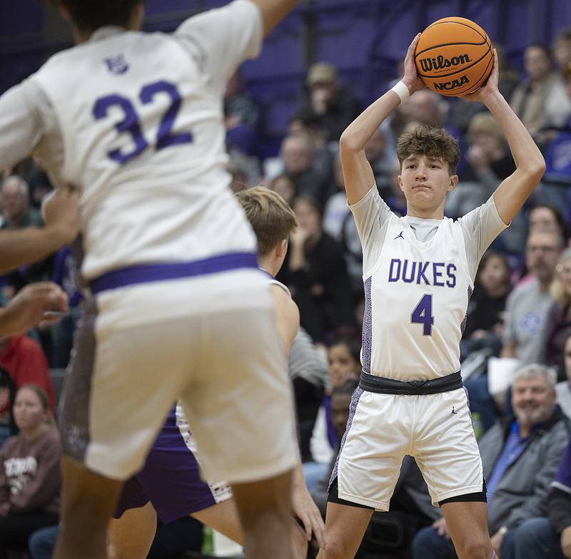 Dixon’s Brody Nicklaus looks to pass against Rochelle Monday, Dec. 9, 2024, at Dixon High School.