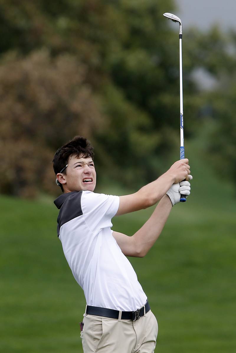 Jacobs’ Barrett Rennell hits a fairway shot on the fifth hole during the IHSA Class 3A Hampshire Regional golf tournament on Wednesday, Sept. 27, 2023, at Randall Oaks Golf Club in West Dundee.