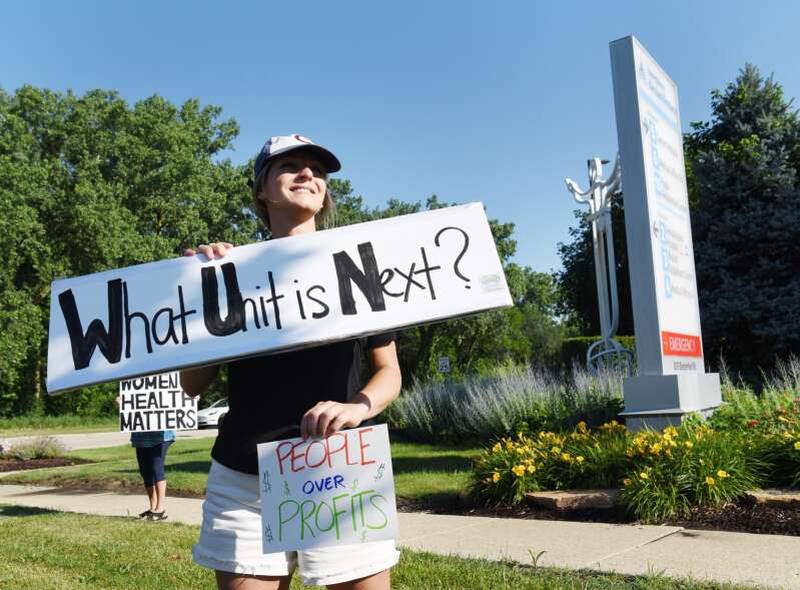 Nurse Kaylyn Krolicki protests the closure of the Infant and Women's Services unit at the Ascension Alexian Brother Medical Center in Elk Grove Village in July 2025.