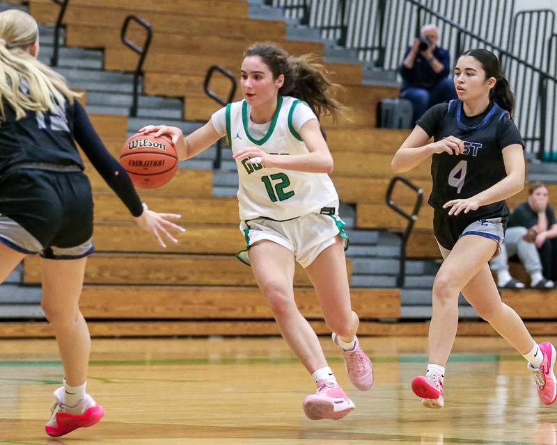 York's Ellie Kehoe (12) races down the court in their York Thanksgiving Tournament game between Oswego East at York on Monday, Nov 18, 2024  in Elmurst.