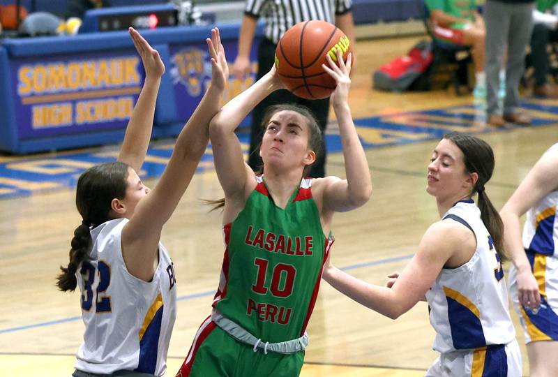 LaSalle-Peru's Bailey Pode gets up a shot over Somonauk's Haley McCoy during their game Thursday, Nov. 16, 2023, in the Tim Humes Breakout girls basketball tournament at Somonauk High School.