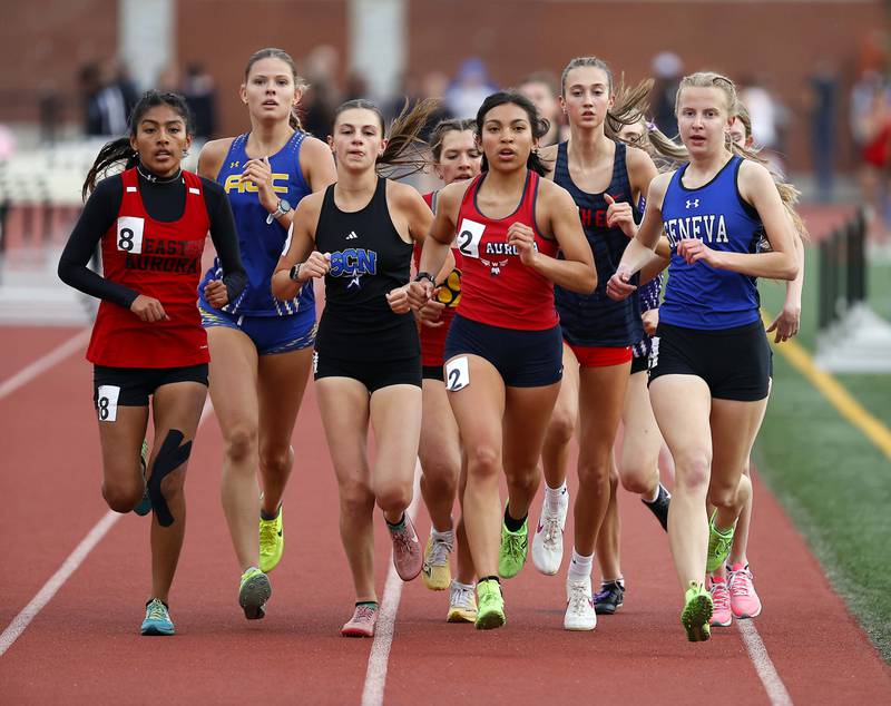 The girls 3200m during the Kane County girls track and field meet at East Aurora High School Friday, May 2, 2025 in Aurora Ill.