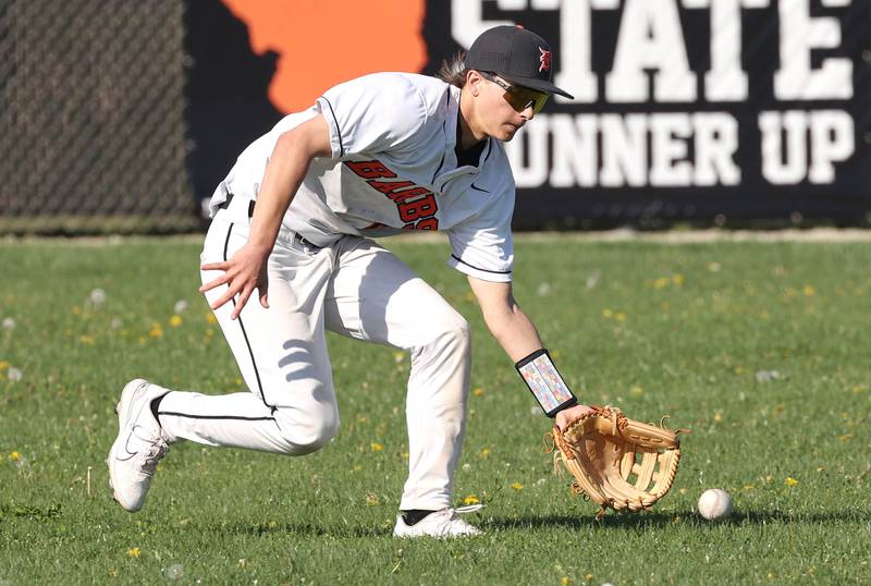 DeKalb's Ruari Bengford-Breneisen makes a play in the outfield during their game against Naperville Central Tuesday, April 30, 2024, at DeKalb High School.