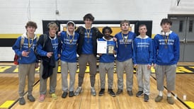 Woodstock’s Taqi Baker earns 100th career win: Saturday’s Northwest Herald sports roundup