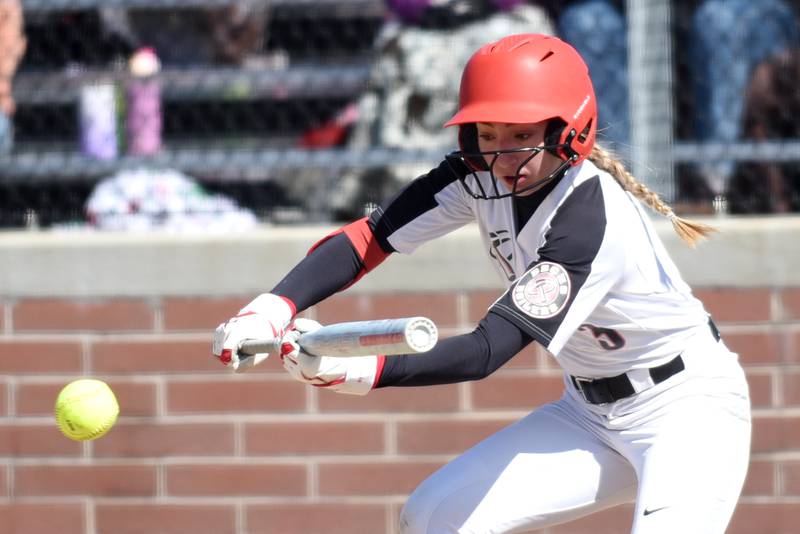 Bradley-Bourbonnais' Bella Pusateri lays down a bunt during a home game against Herscher Monday, March 24, 2025.