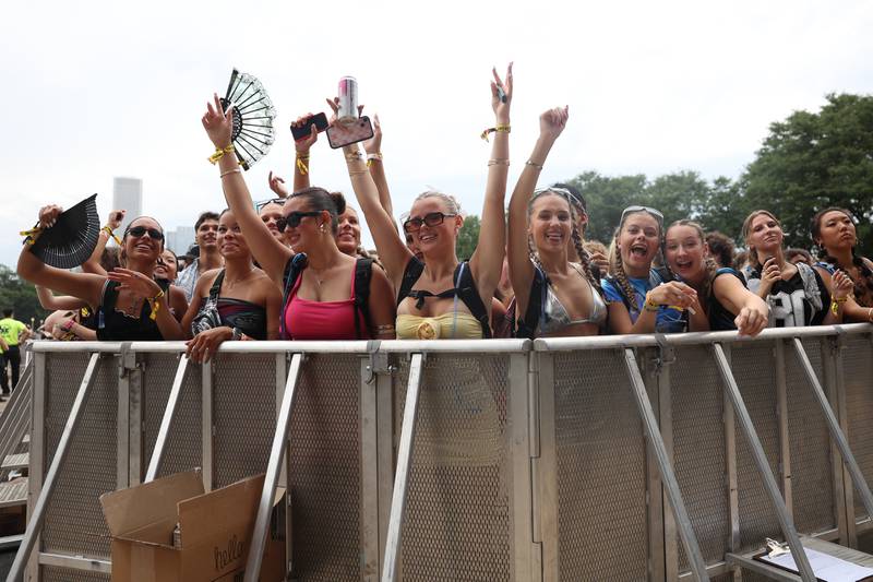 Fans dance to Brandi Cyrus, daughter of Billy Ray Cyrus and sister of Miley Cyrus, performing at Lollapalooza on Aug. 1, 2024 in Chicago.