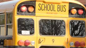 Two adults injured in school bus rollover crash in DeKalb