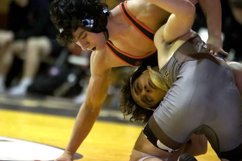 Jacobs’ Ryan Chehade, bottom, battles Crystal Lake Central’s Abe Palomino at138 pounds in varsity wrestling on Thursday, Jan. 16, 2025, at Jacobs High School in Algonquin.