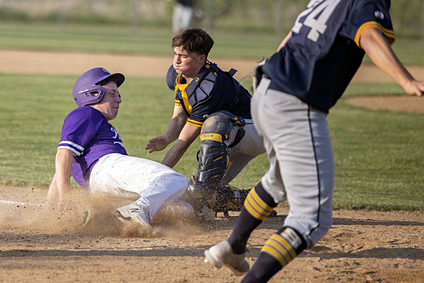 Sterling’s Ayden Schoon tags out Rochelle’s Dylan Gapski in class 3A regional action on Monday, May 22, 2023.