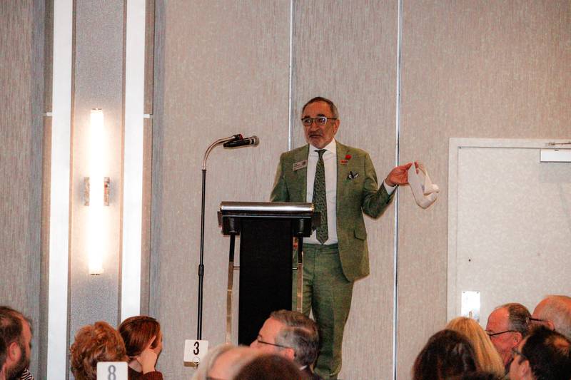 Crystal Lake Mayor Haig Haleblian reads Gen Z slang at the State of the Community Luncheon in Crystal Lake Feb. 14, 2025.