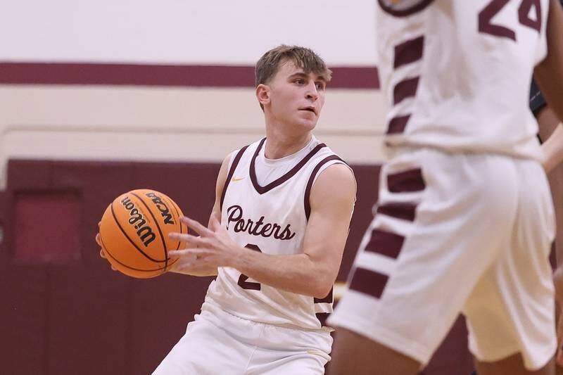 Lockport’s Bryce Turner looks for a play against Plainfield North on Friday, Jan. 3, 2025 in Lockport