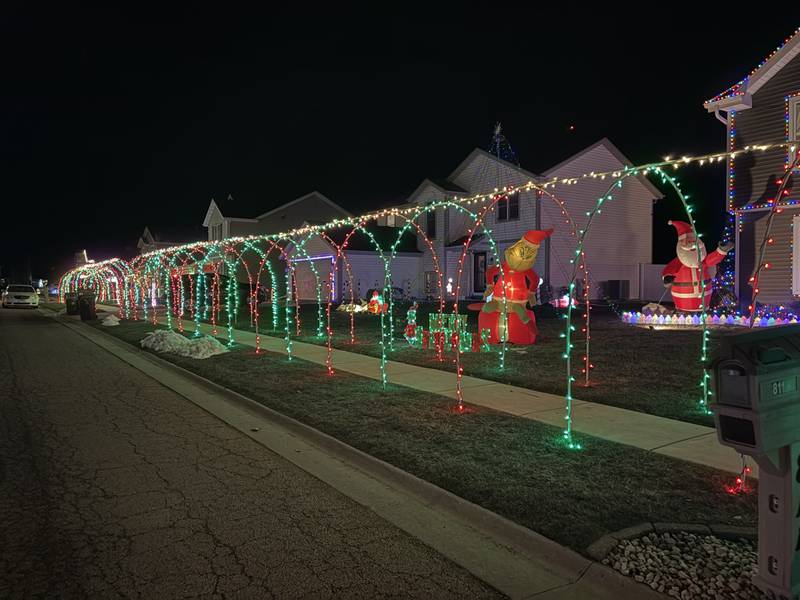A view of Christmas decorations lining the sidewalk on the 800 block of Banbury Drive in Ottawa on Sunday, Dec. 21.