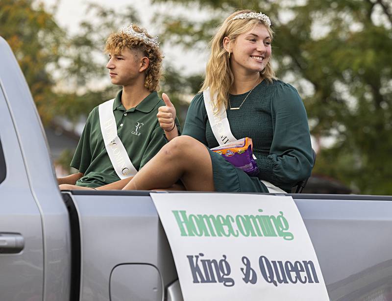 Rock Falls homecoming king Carter Dillon and queen Claire Bickett ride through the parade Thursday, Sept. 21, 2023.