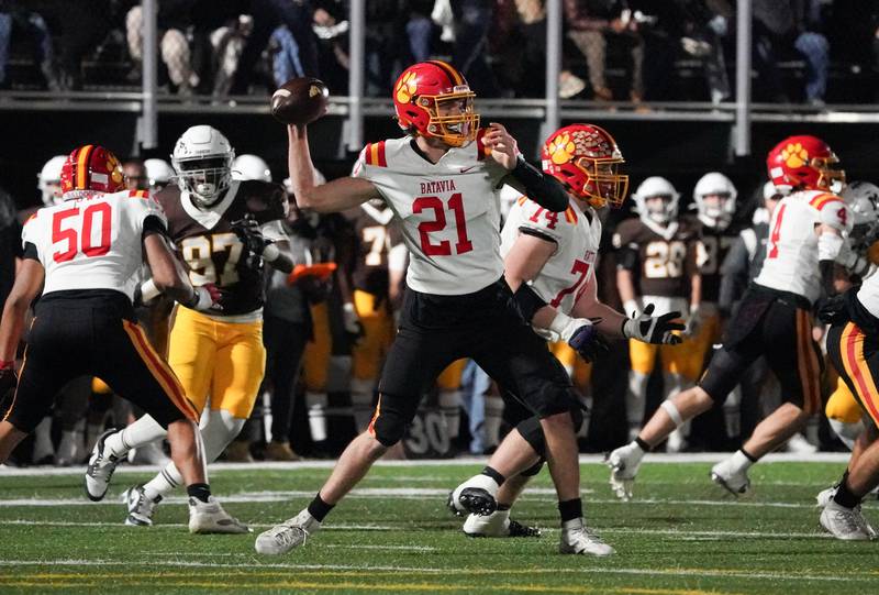 Batavia’s Ryan Boe (21) throws a pass against Mt. Carmel during a class 7A semifinal football playoff game at Mt. Carmel High School in Chicago on Saturday, Nov 18, 2023.