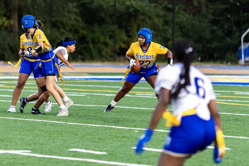Joliet Central's Georgiana Majerus looks for an opening during a varsity flag football home game against Bloom on Sept. 11, 2025.