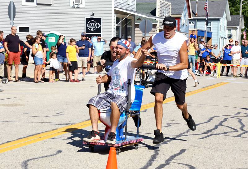 Team Main Street Patriots competes in the 2024 Maple Park Fun Fest Toilet Bowl Races on Saturday, Aug. 31, 2024 in Maple Park.