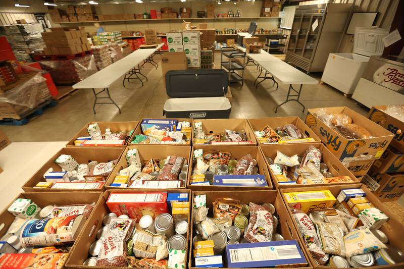 Boxes of food are organized on a table at the Illinios Valley Foody Pantry on Tuesday, April 28, 2026 in Peru.