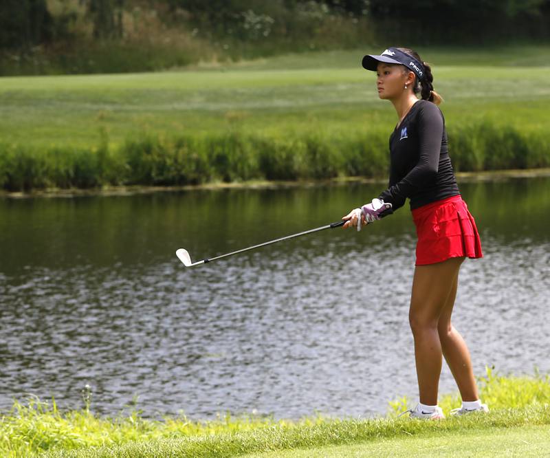 Jordan Cheng watches her approach shot on the fifth hole during the final round of McHenry County Junior Amateur Golf Tournament  on Tuesday, July 18, 2025, at Foxford Hills Golf Club in Cary.