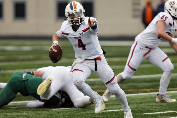 District 308 school officials cheering on Oswego High School football team