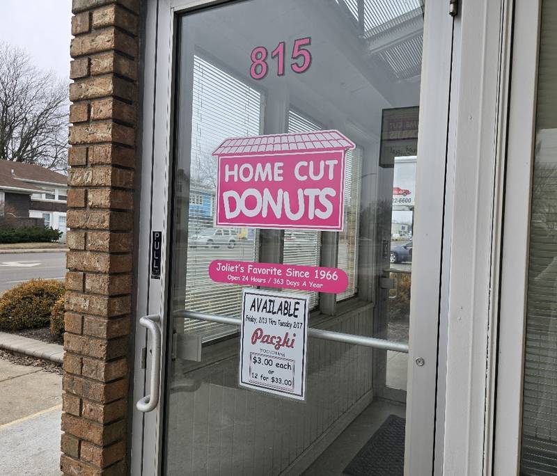 A sign on the door of Home Cut Donuts in Joliet announcing the availability of Paczki, a traditional jelly-filled, doughnut-like pastry, which many people enjoy before the start of the Christian Lent, is seen on Saturday, Feb. 14, 2026.