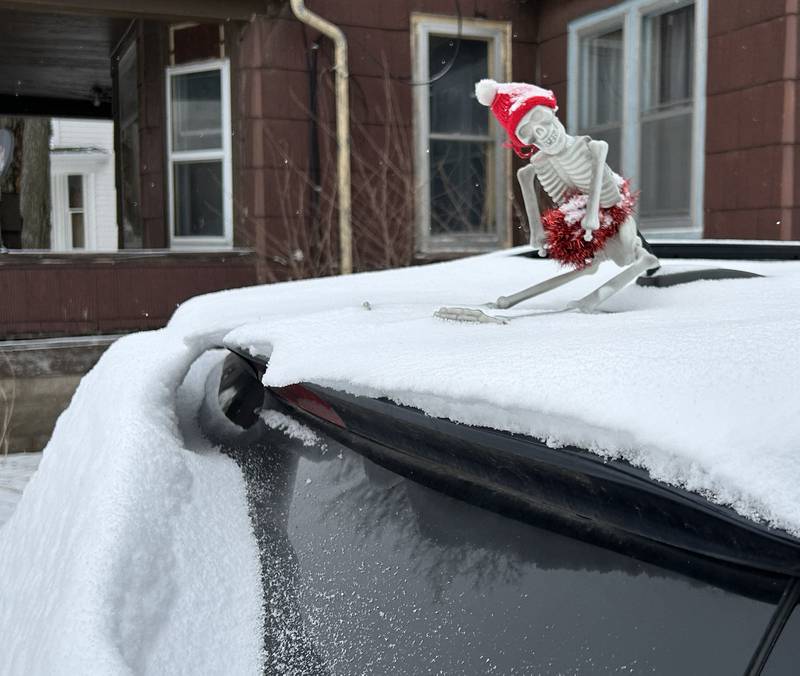 This roof ornament on a car in Dixon finally had some snow to make its attire more appropriate when several inches of light, fluffy snow fell across the region on Wednesday, Feb. 12, 2025.