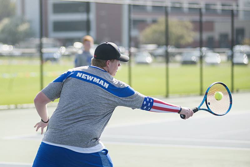Newman’s Tyler Bonnell plays a shot against Sterling Monday, May 9, 2022. Bonnell and doubles partner Koda Brininger faced off against Sterling’s Connor Pham and Luke Valentino.