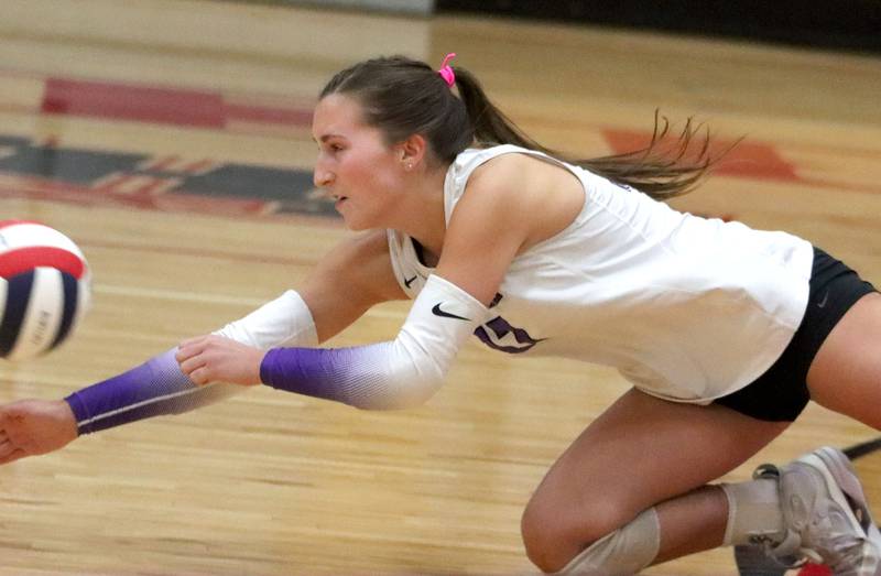 Hampshire’s Megan Spenk lunges for the ball in girls varsity volleyball at Huntley High School on Thursday, October 23, 2025.