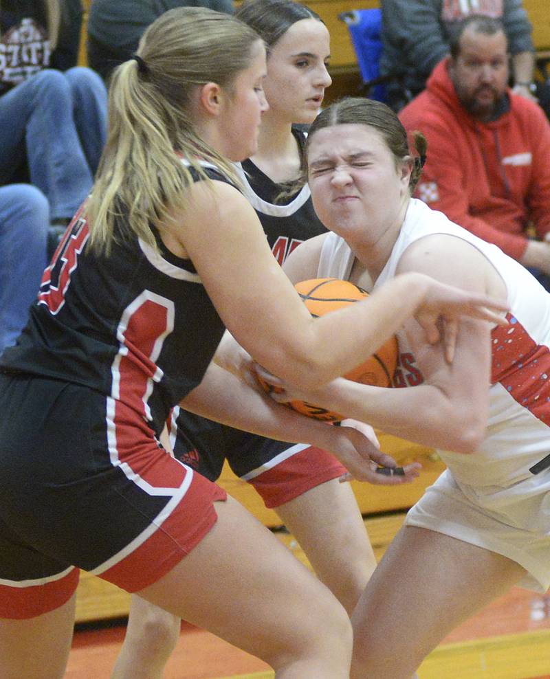 Henry-Senachwine’s Grace Anderson and Streator’s Leah Krohe fight for control of the ball in the 2nd period Tuesday at Streator.