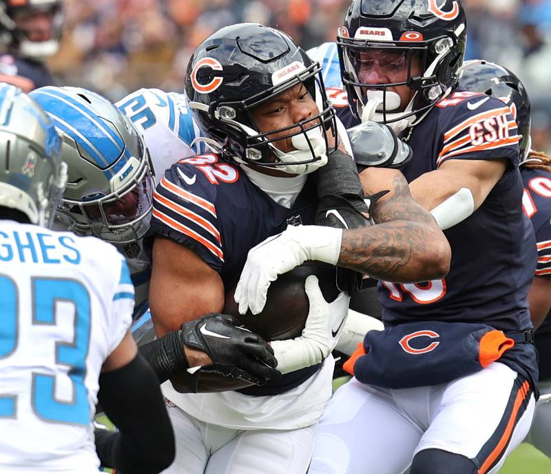Chicago Bears running back David Montgomery carries the ball through the Lions defense during their game Sunday, Nov. 13, 2022, at Soldier Field in Chicago.
