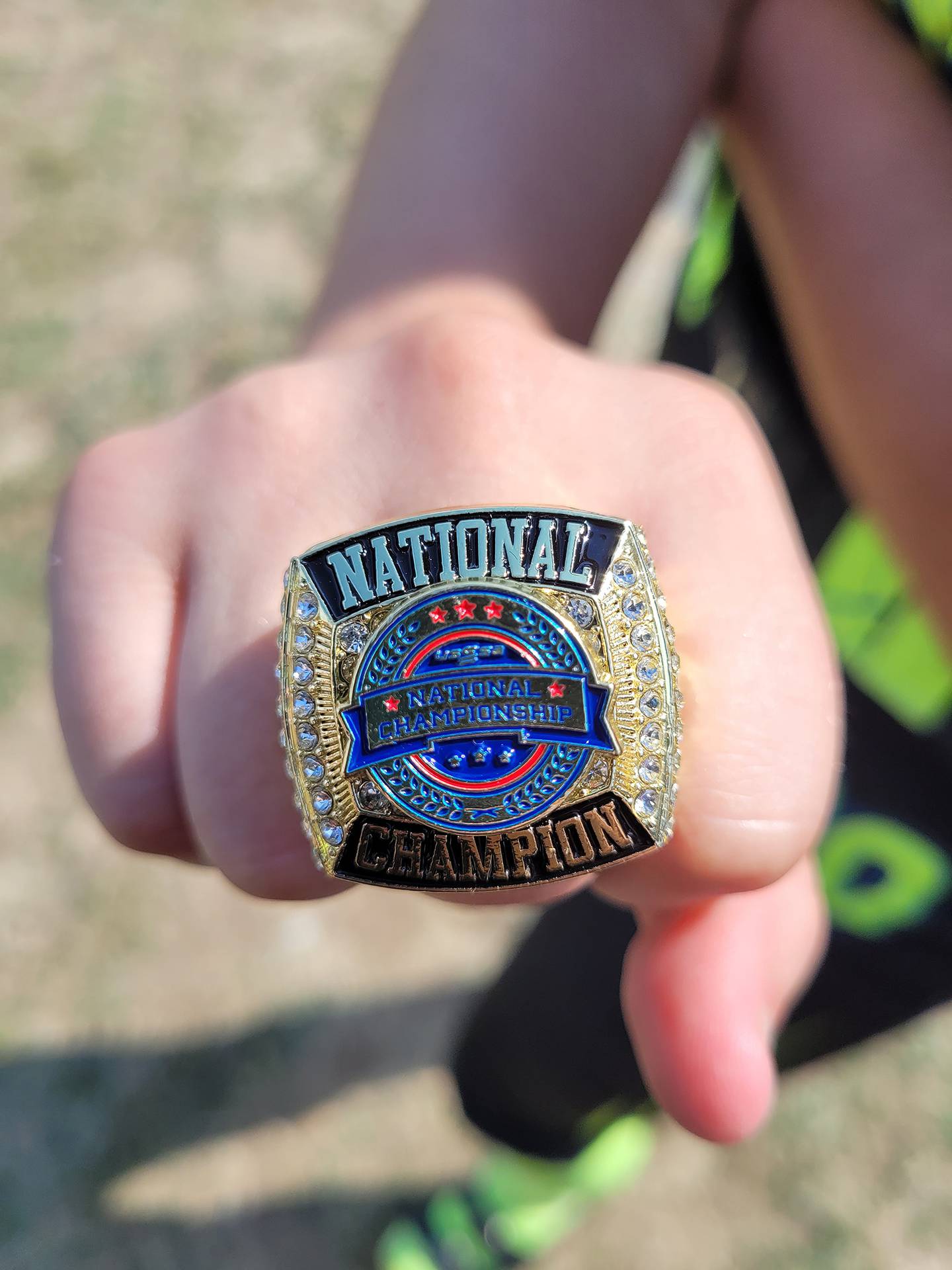 Polo's Cheyenna Wilkins shows off the USSSA national championship ring that her team, Midwest Aftershock 16U, won this summer at the USSSA Great Lakes Nationals in Evansville, Indiana.