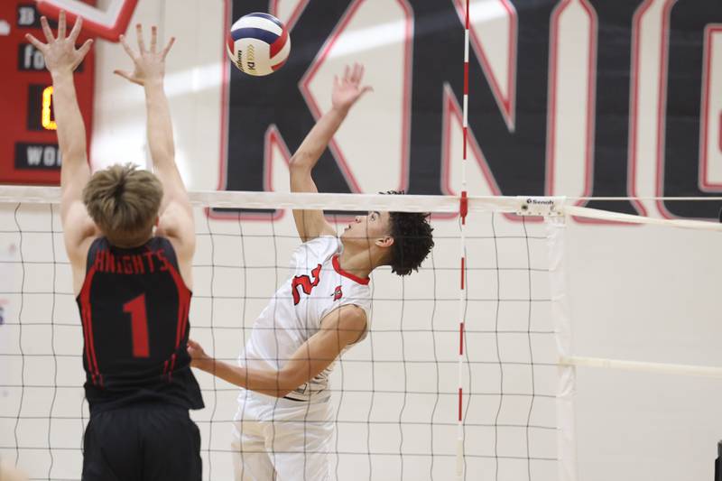 Bolingbrook’s Trevor Wardlow goes up for the kill against Lincoln-Way Central on Tuesday May 7, 2024 in New Lenox.