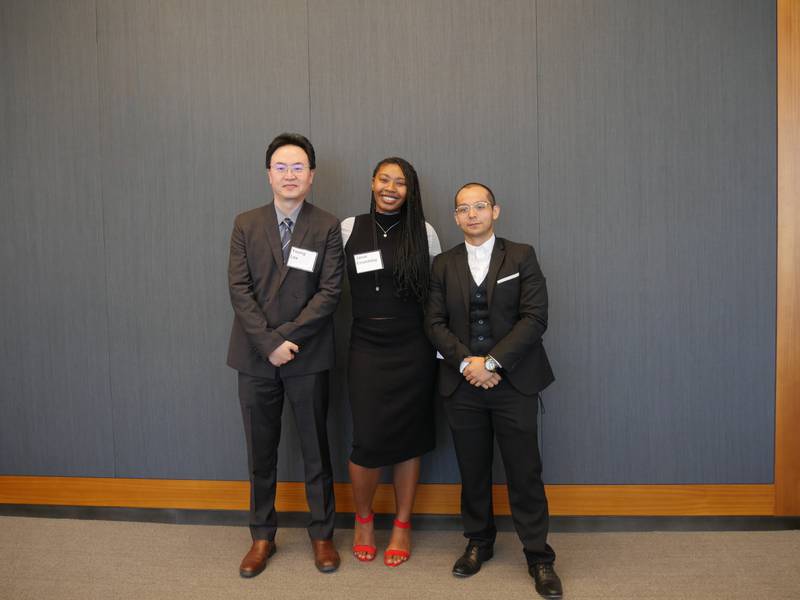 Northern Illinois University Law students Young Lee, Janai Crumbley, and Kyle Toledo pose at a Jumpstart reception on August 3 at Jones Day in Chicago.