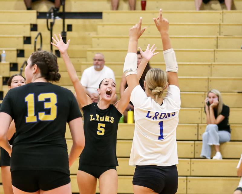 Lyons celebrates the win over Lockport in their volleyball match.  Aug 27, 2024.