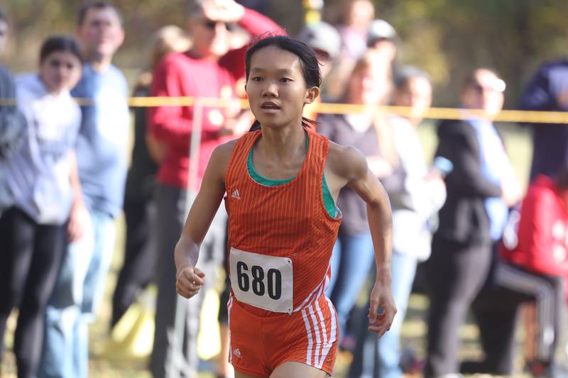 Oswego’s Kelly Wong heads to the finish fifth in the Girls Cross Country Class 3A Minooka Regional at Channahon Community Park on Saturday.