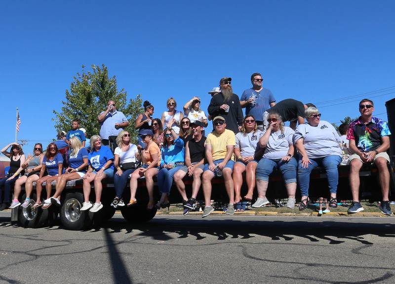 The Princeton High School class of 1988 rides on a float during the 52nd annual Homestead Festival parade on Saturday, Sept. 9, 2023 in Princeton.
