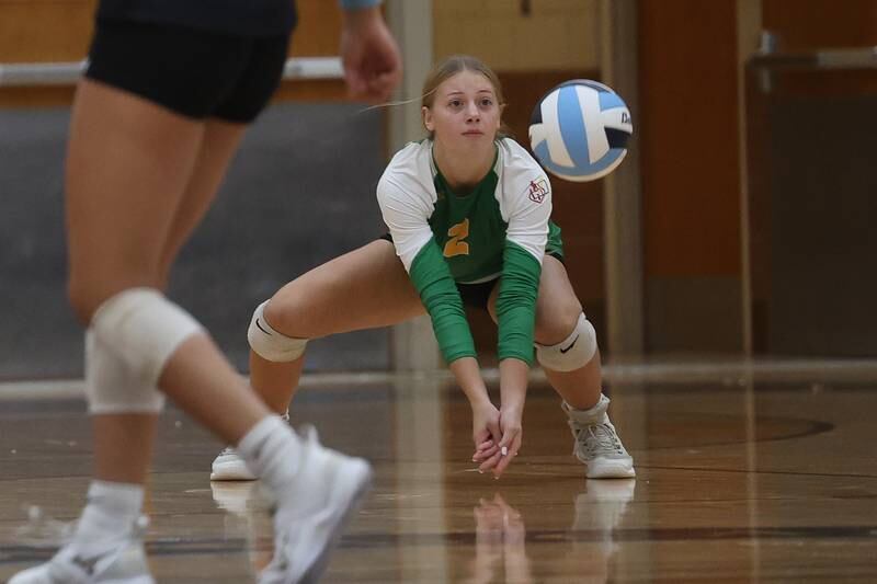 Providence’s Emma Winjum gets low for the dig against Joliet Catholic on Thursday, Sept. 14, in Joliet.