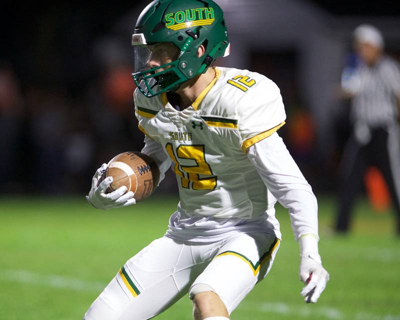 Crystal Lake South's Aidan Next looks for room  against Crystal Lake Central on Friday, Sept. 27,2024 in Crystal Lake.