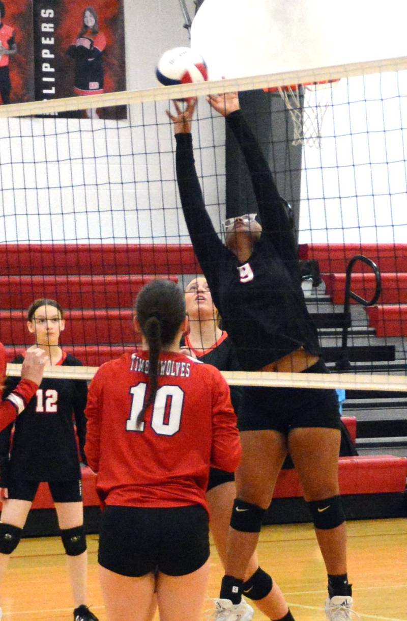 LaMoille's Olivea Glasper makes a play at the net in Tuesday's Little Ten match against Indian Creek in LaMoille. The Timberwolves won 25-20, 25-18.