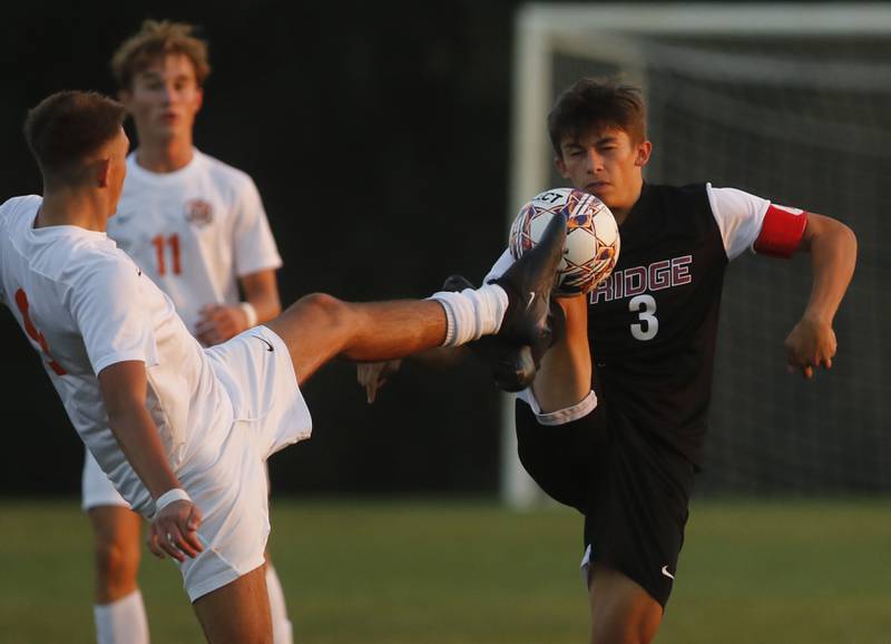 Crystal Lake Central's Mattia Zavattaro and Prairie Ridge's Joshua Marineau battle for the ball during a Fox Valley Conference soccer match on Thursday, Oct. 10, 2024, at Prairie Ridge High School.