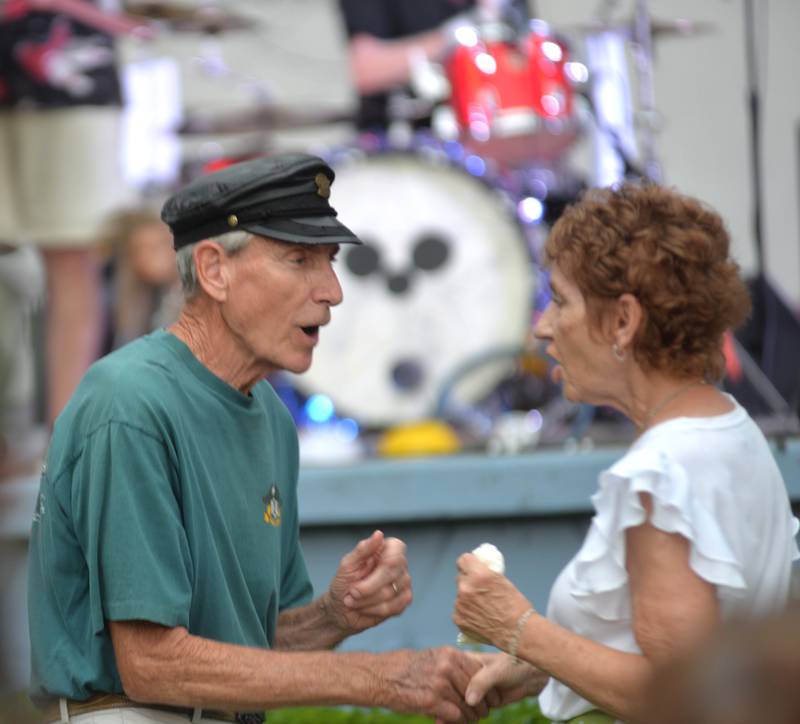 George and Nancy Poe of Mt. Morris dance to the rock and roll song "Gloria" by Van Morrison as it is performed by Captain Rat and the Blind Rivets during the Mt. Morris Jamboree concert on Friday, Aug. 15, 2025.