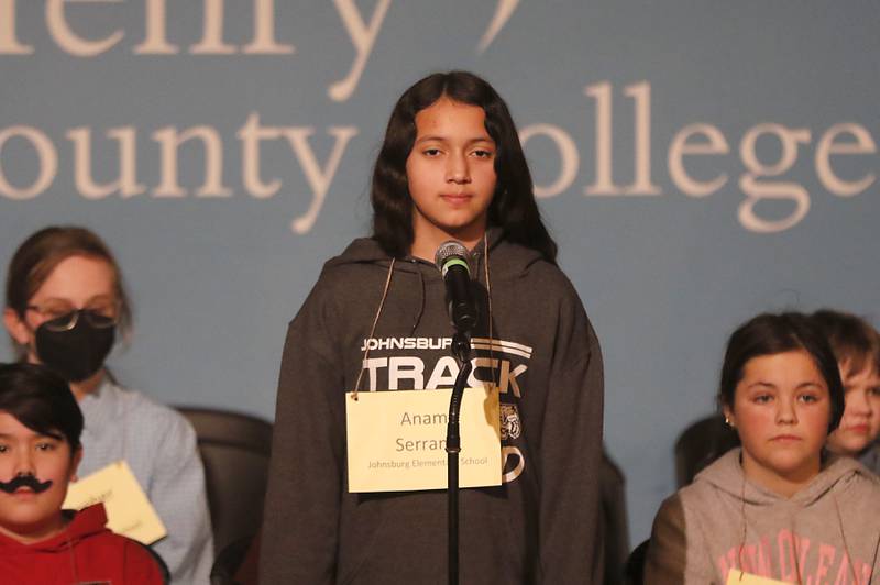 Anami Serrano of Johnsburg Elementary School competes in the McHenry County Regional Office of Education 2023 Spelling Bee Wednesday, March 22, 2023, at McHenry County College's Luecht Auditorium in Crystal Lake.