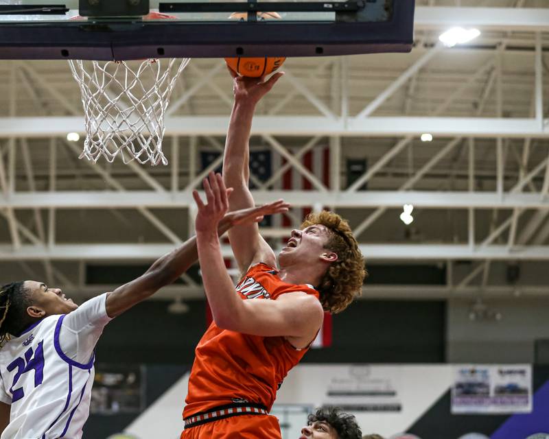 Sandwich's Dom Rome (22) puts in a layup during their basketball game between Sandwich at Plano. Jan 27, 2025 in Plano.