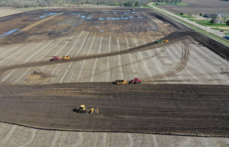 Excavators move dirt at the site of the future Ollie's Bargain Outlet warehouse distribution center on Tuesday, April 18, 2023 just to the north of the intersection of Illinois Route 26 and Progress Drive in Princeton. The 600,000 square-foot facility will be built on 130 acres and create more than 145 jobs. The project is expected to cost 68 million.