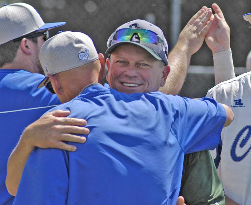 Newman head coach Kenny Koerner and Rock Fall head coach Donnie Chappell embrace following the 2A Regional final at Larry Ybarra field at Newman High School, Saturday, May 18th 2024.