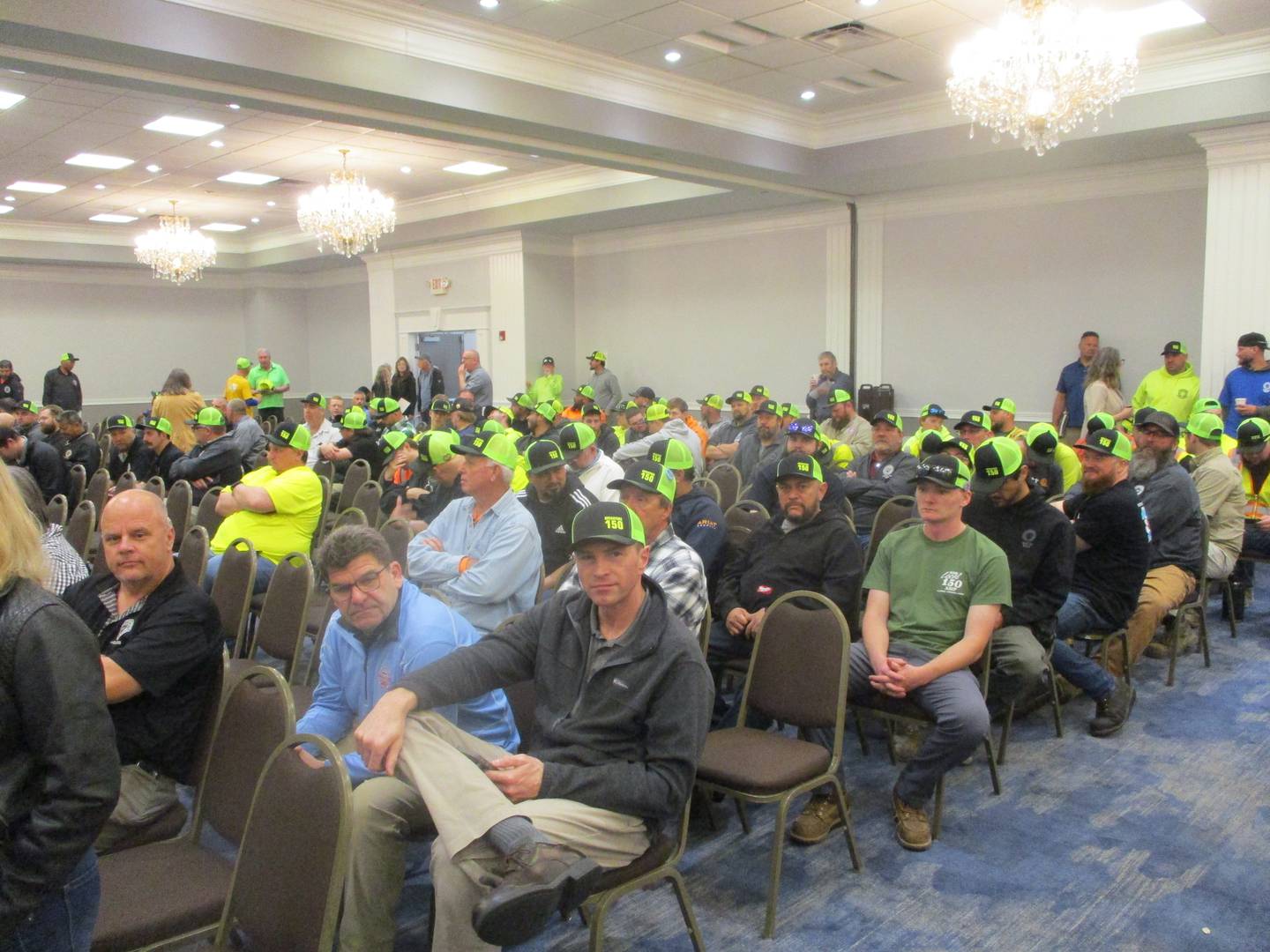 Construction union members gather at a Will County Board meeting to show their support for proposed solar projects. April 16, 2026
