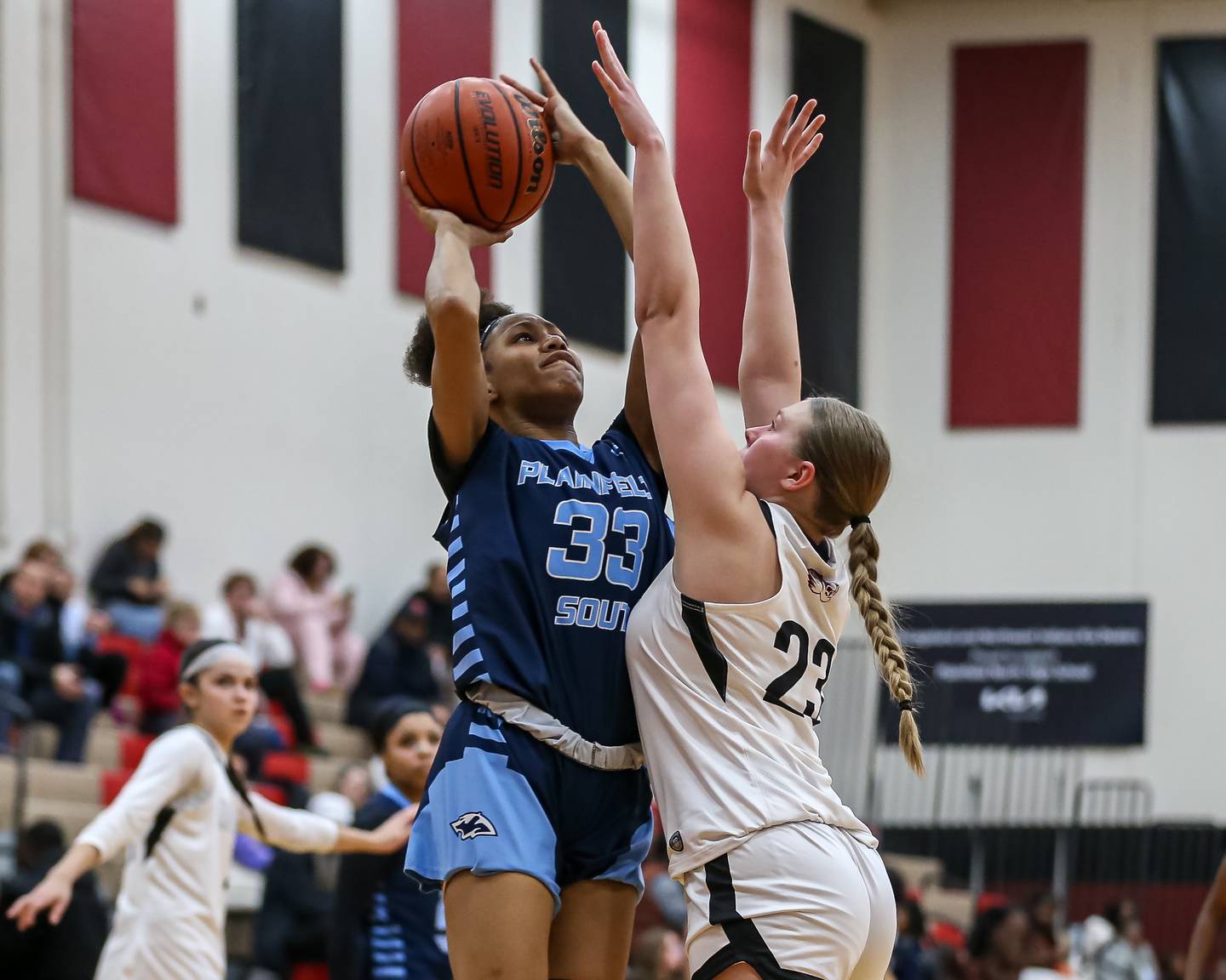 Plainfield South's Jazlynn Foster (33) puts up a shot during basketball game between Plainfield South at Plainfield North. Jan 4, 2024.