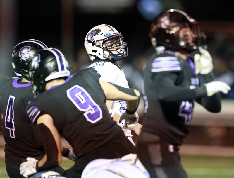 Prospect's kicker watches his field goal attempt during the IHSA Class 7A playoff football game Friday, Oct. 31, 2025 in Downers Grove.