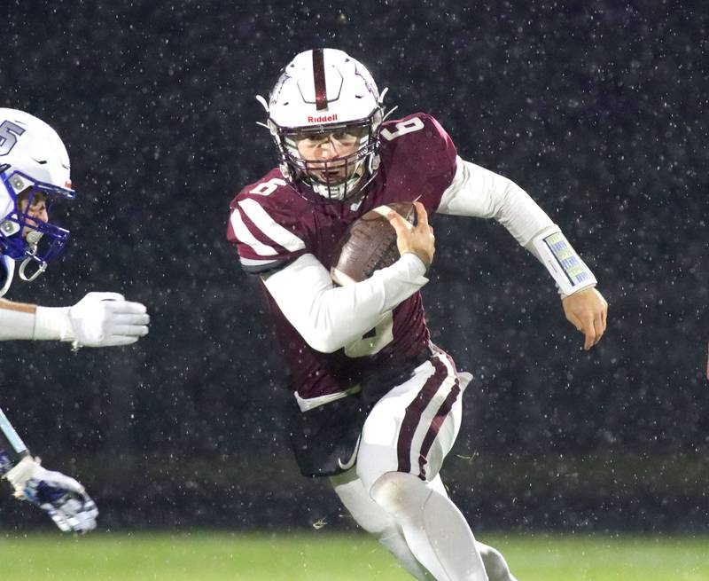 Prairie Ridge’s Luke Vanderwiel runs the ball against Vernon Hills in IHSA football Class 5A first-round playoff action at Prairie Ridge High School in Crystal Lake on Friday, October 31, 2025.