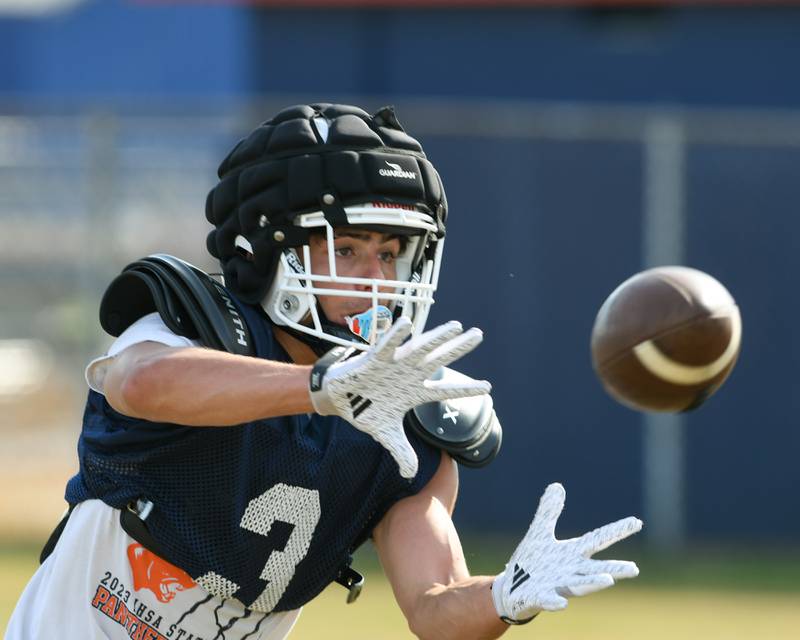 Teddy Manikas of Oswego catches the ball during a joint practice with Kaneland High School on Thursday July 10, 2025, held at Oswego High School.
